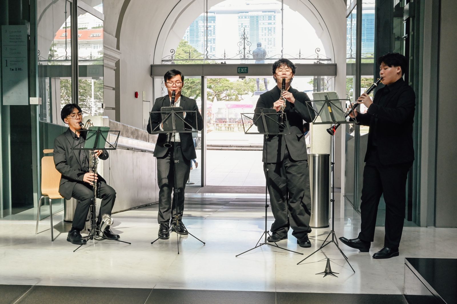 A clarinet quartet performing